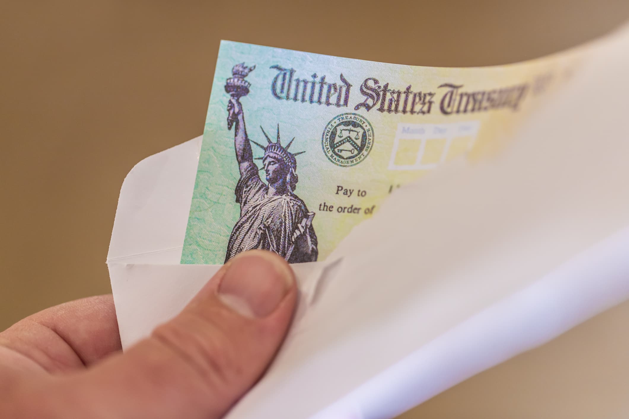 US government is phasing out paper checks. Here’s what that means